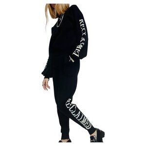 Reclaimed Vintage inspired sweater and pants with logo in black. Size 4